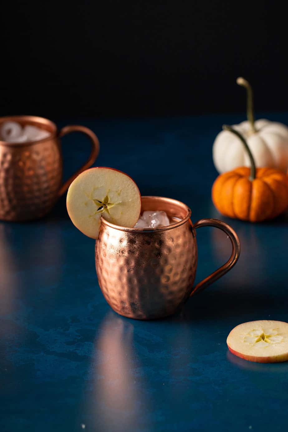 two copper mugs with kentucky mules