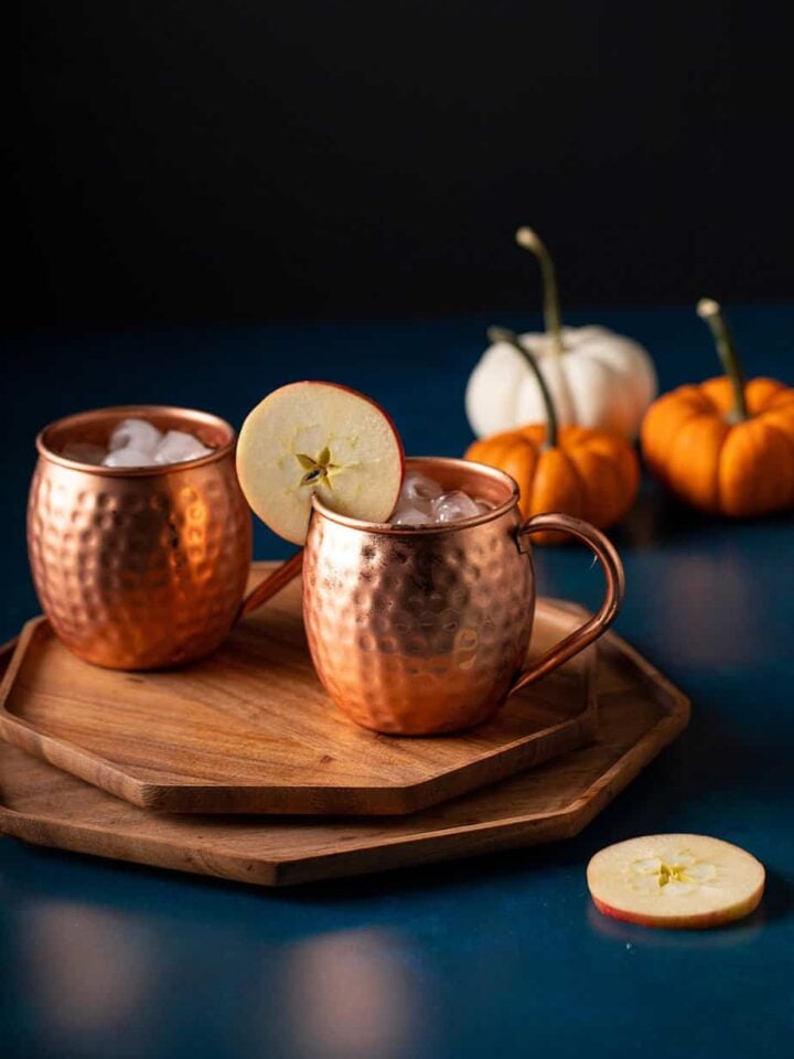 two copper mugs with kentucky mules