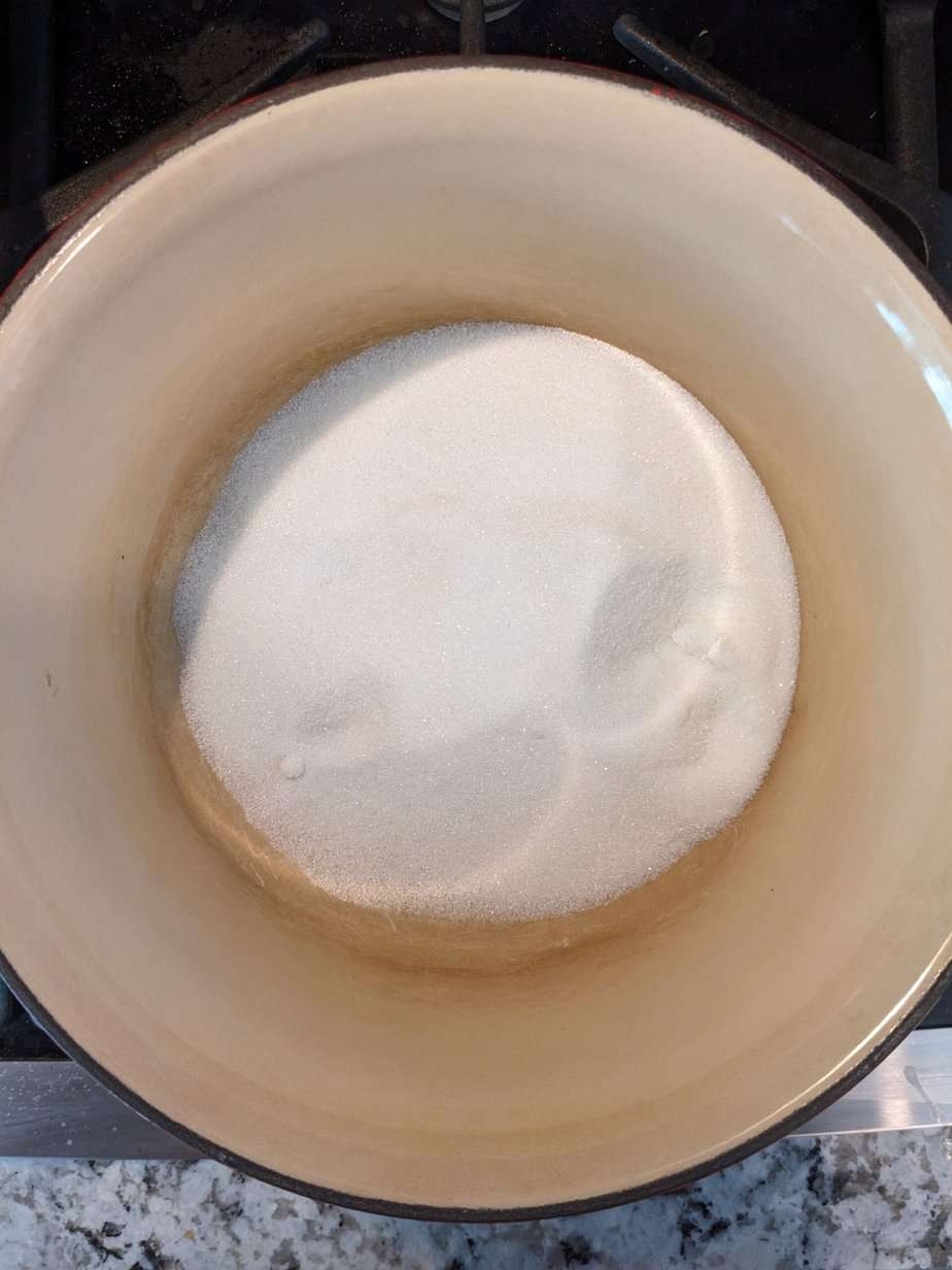 a saucepan with sugar