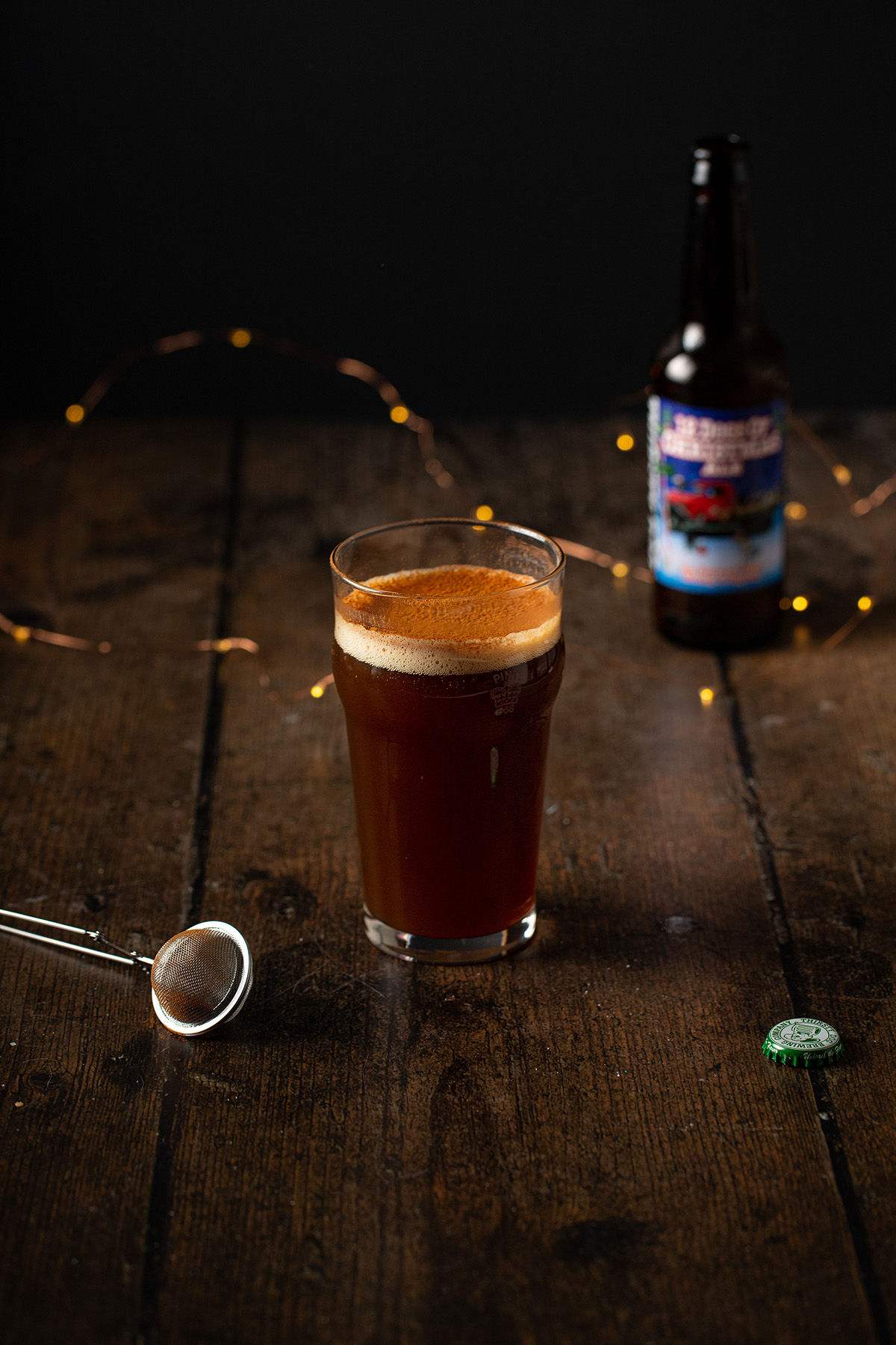 a loaded christmas ale on a wooden background
