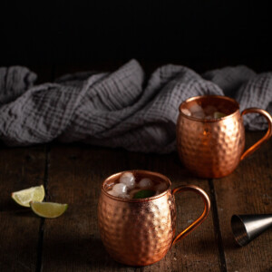 two copper mugs of moscow mules.