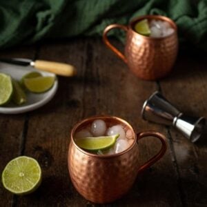 two copper mugs of mexican moscow mules