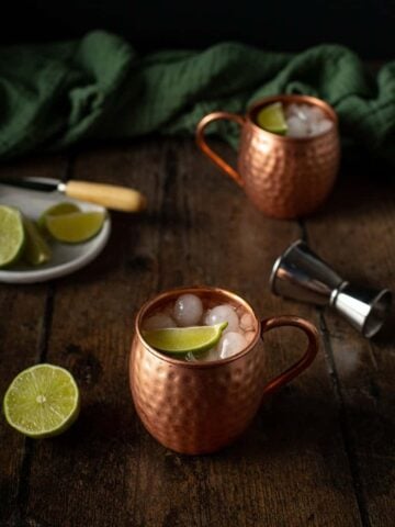 two copper mugs of mexican moscow mules