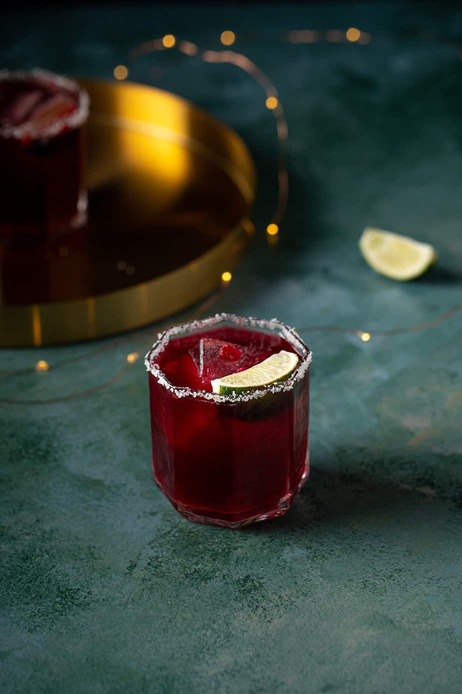 pomegranate margarita on a green background