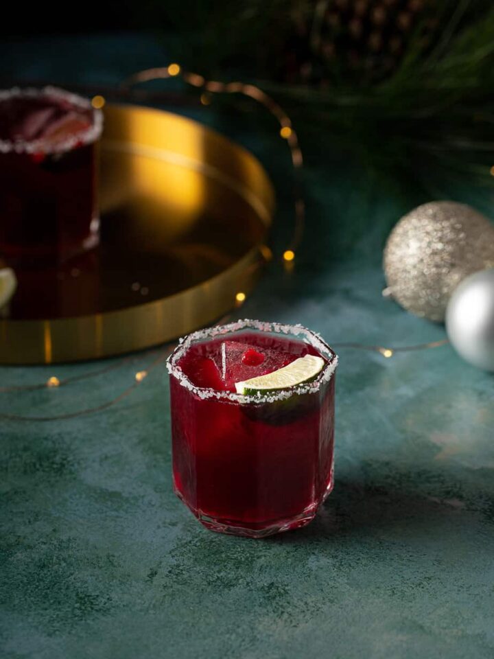 pomegranate margarita on a green background