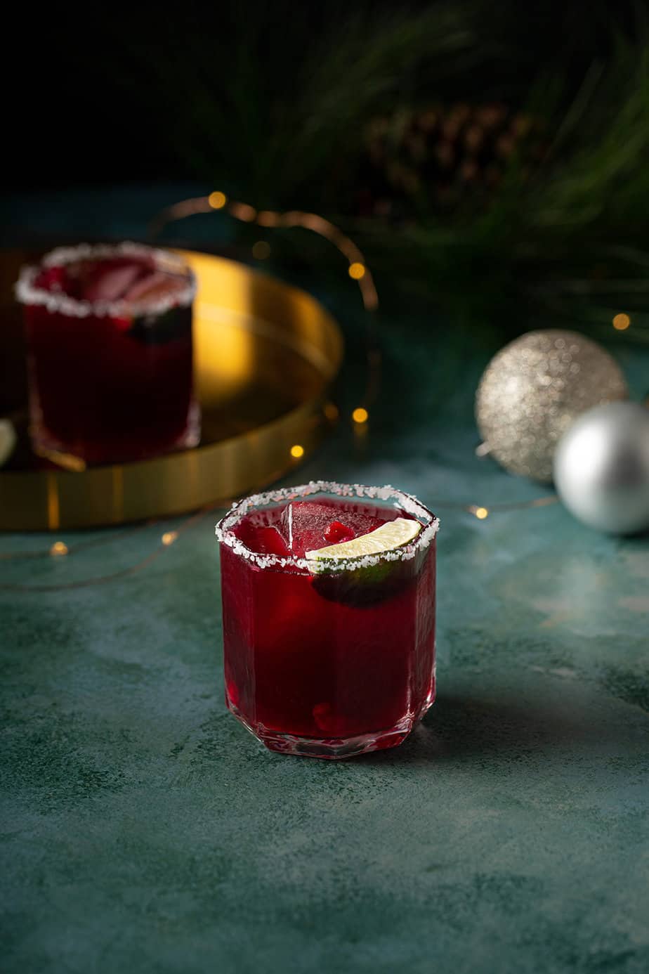 pomegranate margarita on a green background