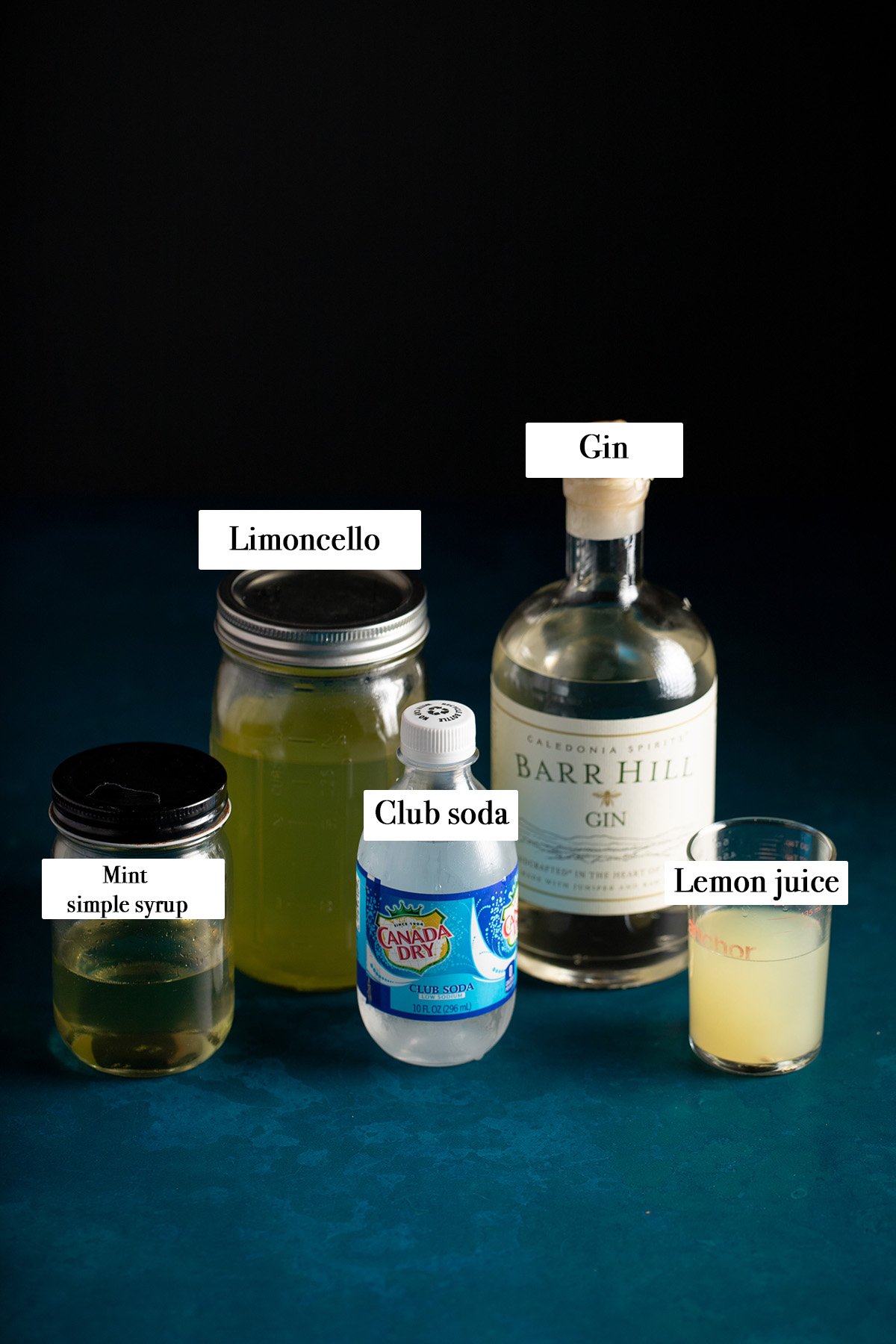 ingredients needed to make a limoncello gin collins cocktail.