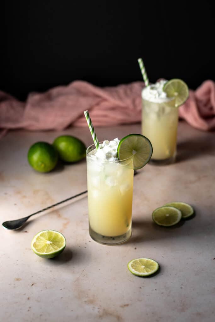 two key lime pie crush cocktails with straws