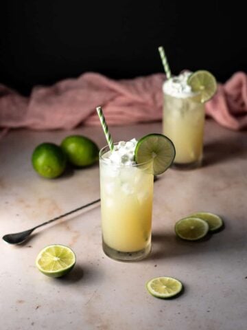 two key lime pie crush cocktails with straws