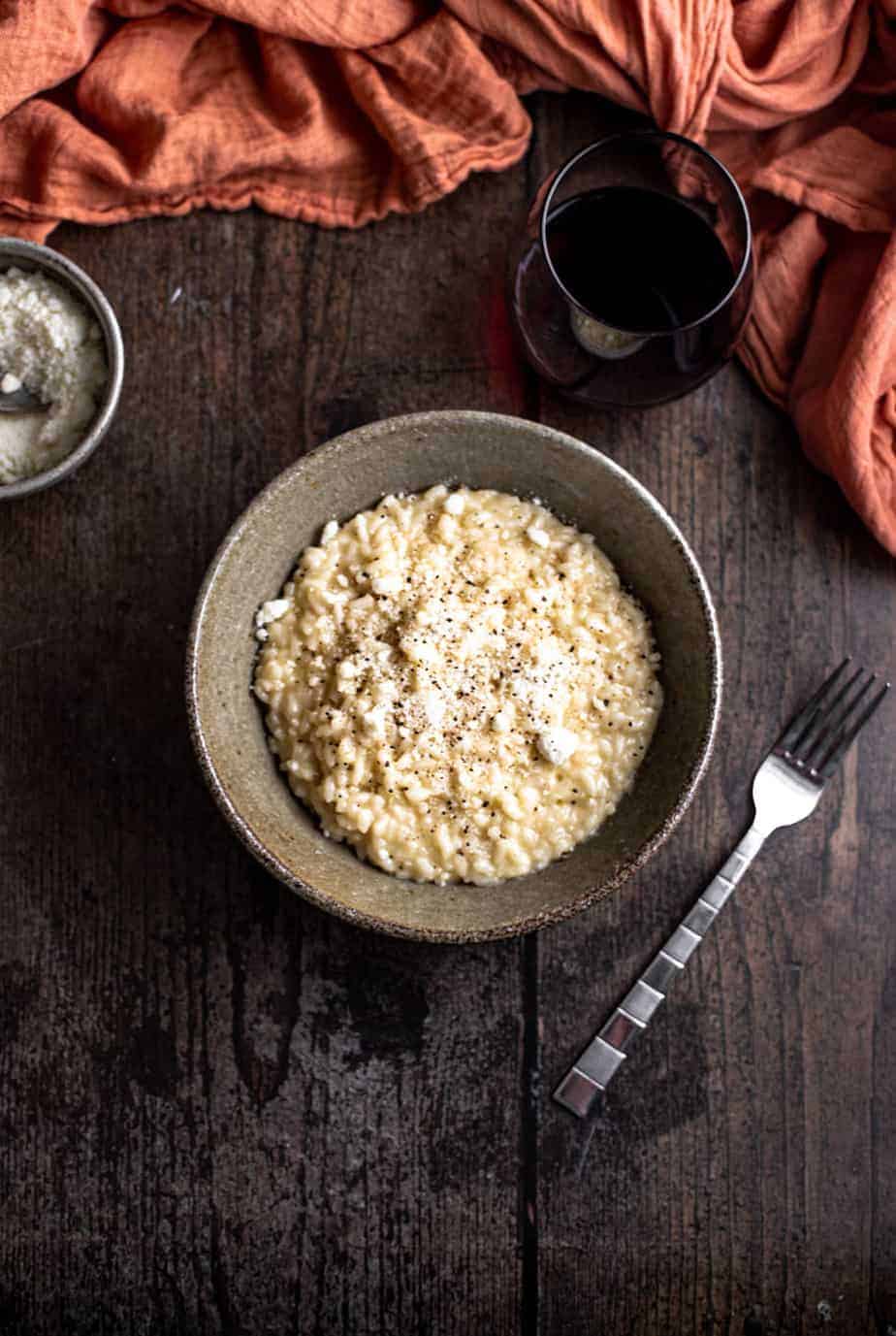 bowl of cacio e pepe risotto seen from overheda