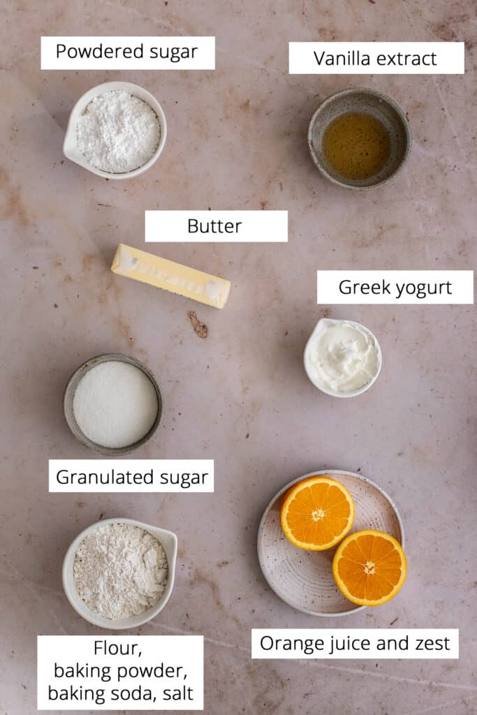 ingredients for making orange cookies, viewed from overhead