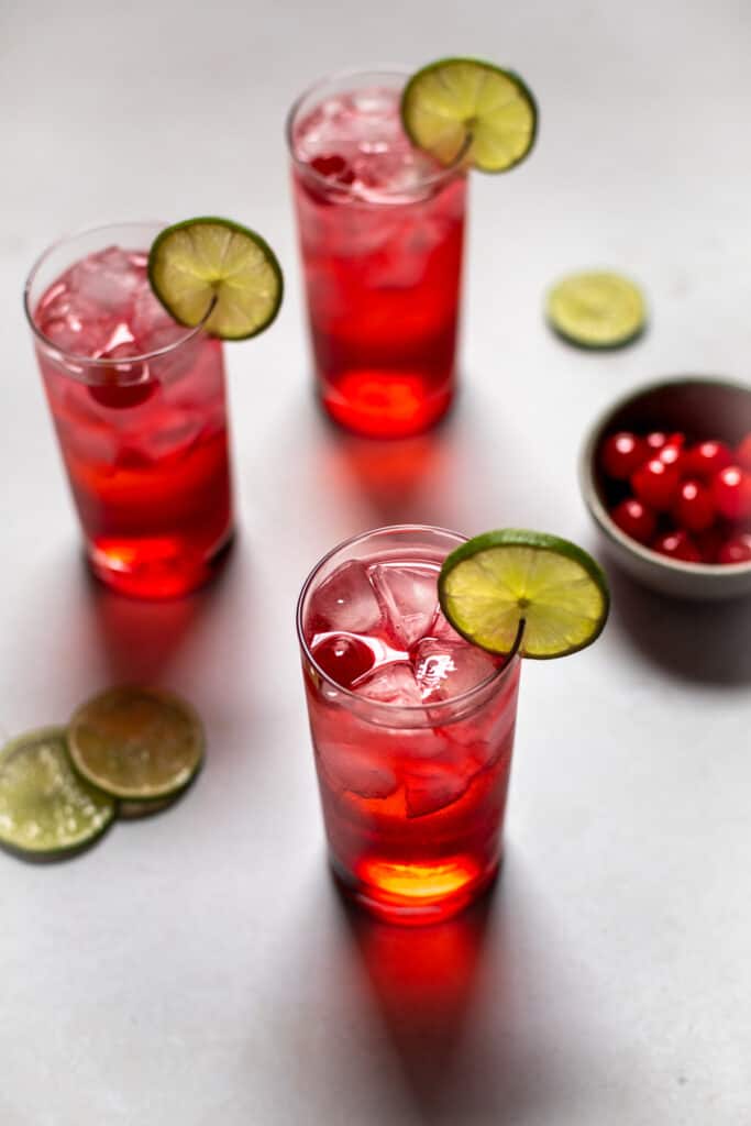 backlit view of 3 dirty shirley cocktails