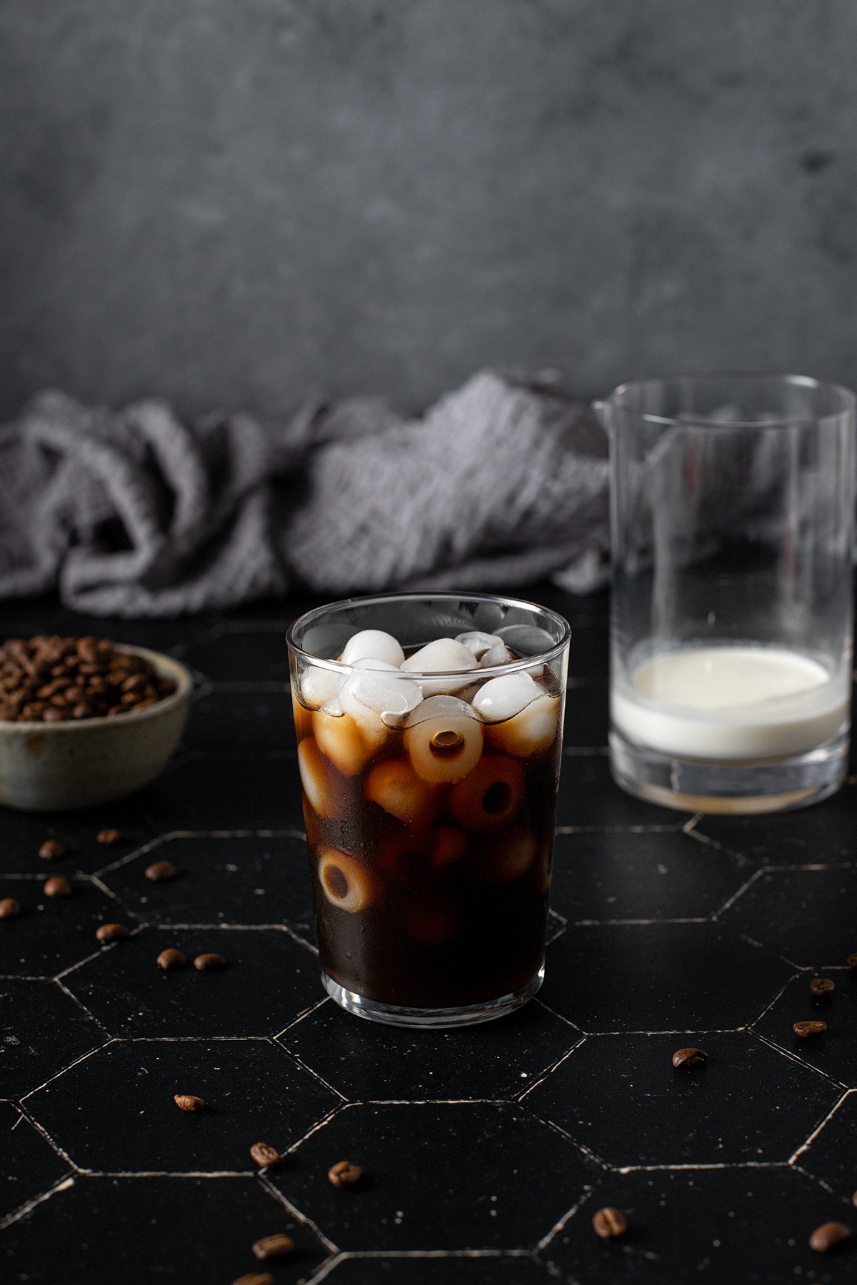 a glass with ice and cold brew coffee