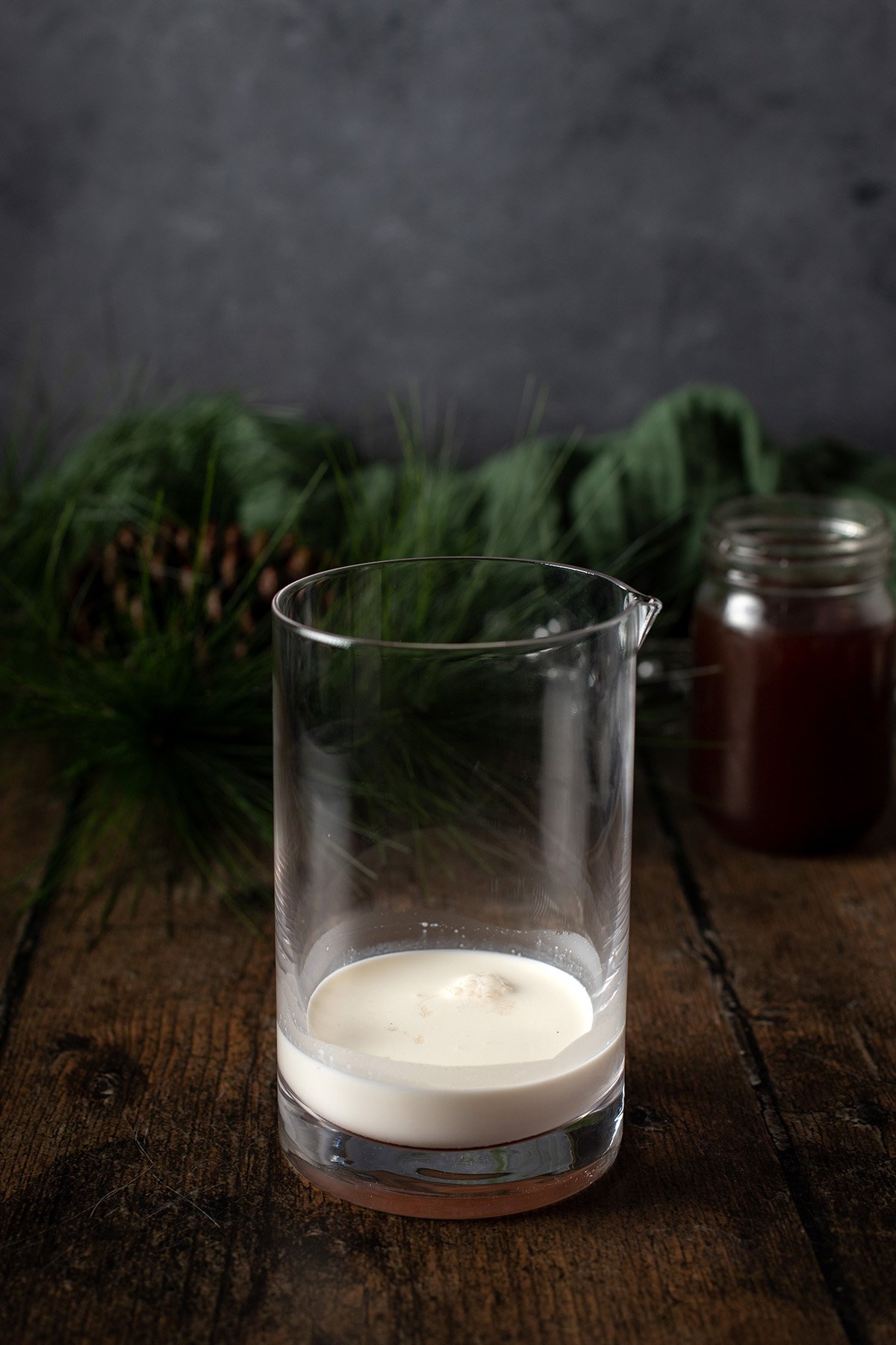 a glass with the ingredients for irish cream cold foam