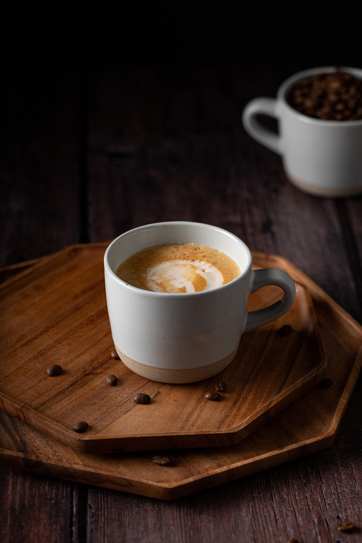 a mug full of blonde vanilla latte on a wooden tray