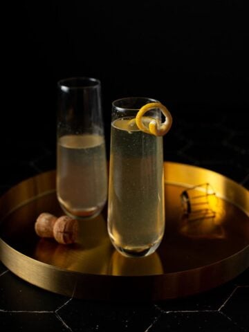two champagne flutes of french 77