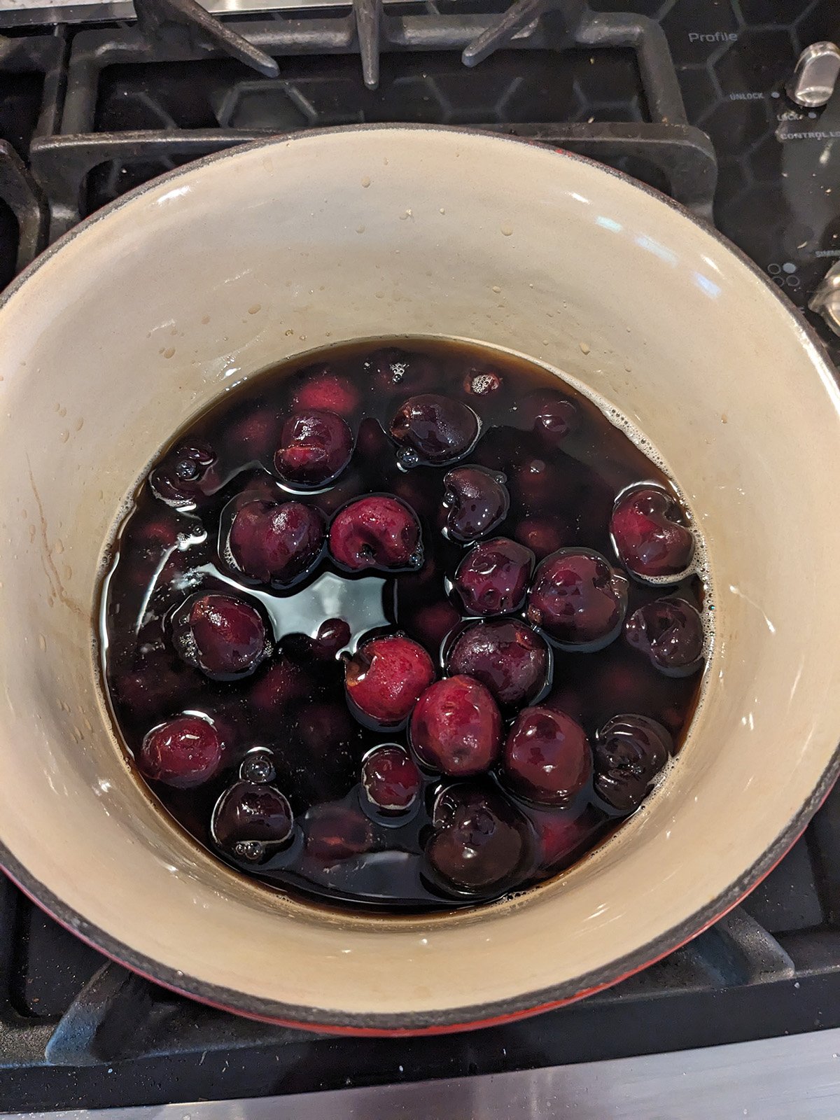 bourbon cherries in a saucepan.