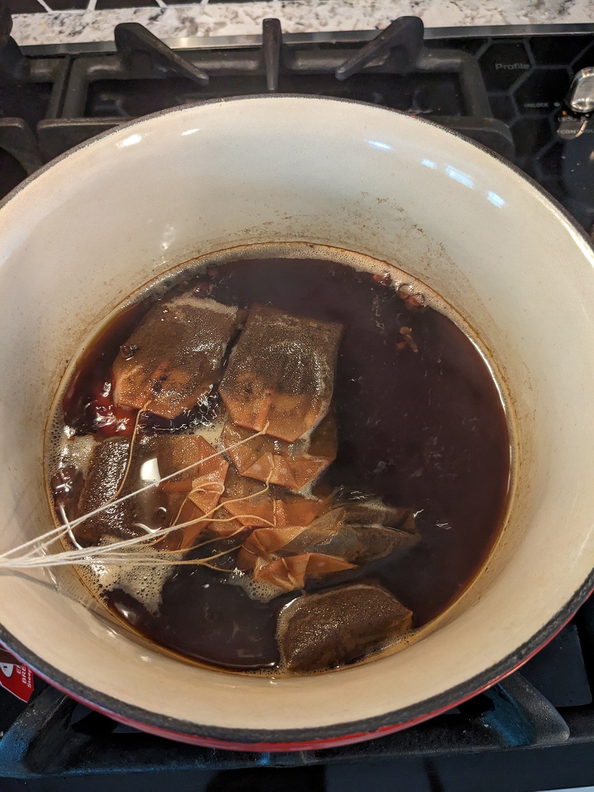 spices and tea bags simmering in water.