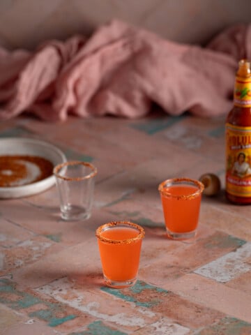two mexican candy shots in shot glasses.