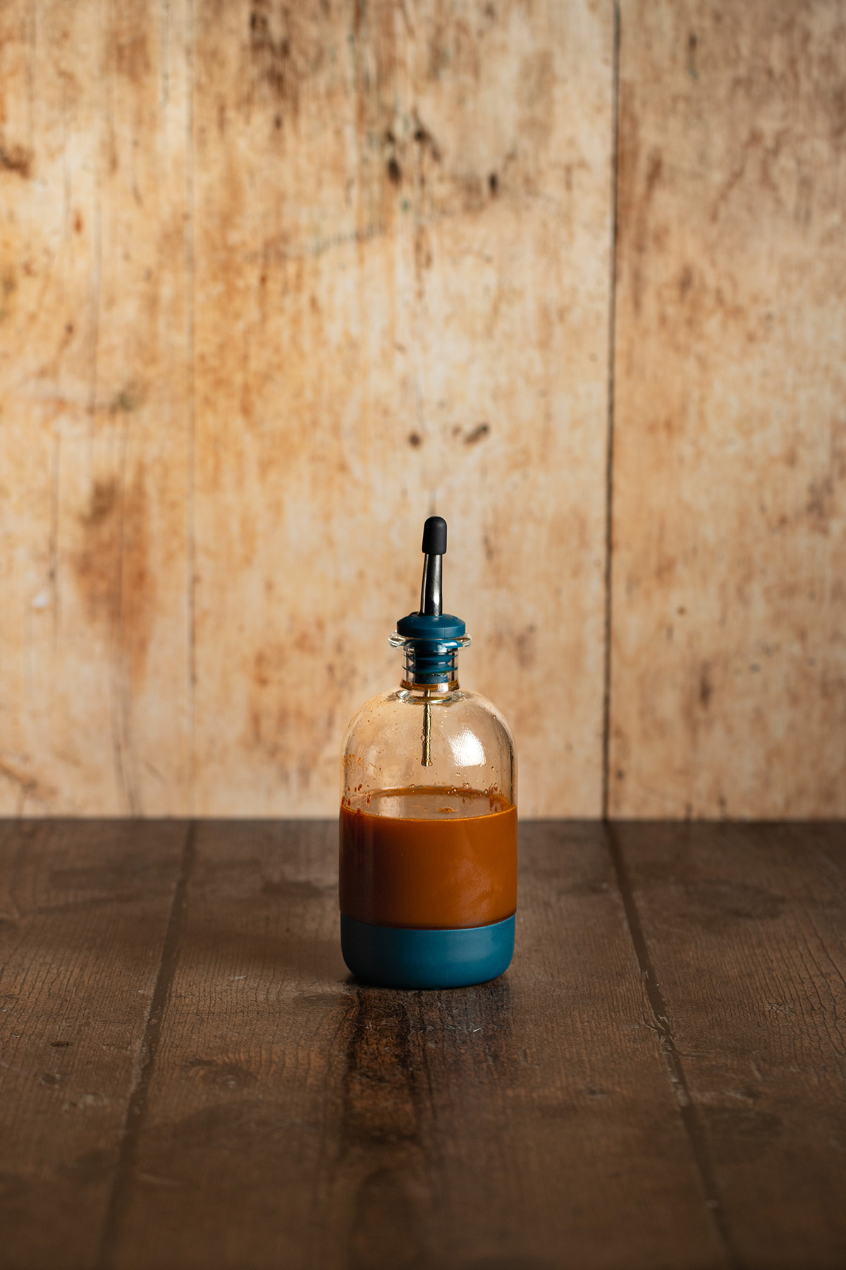 a small bottle full of carrot cake syrup.
